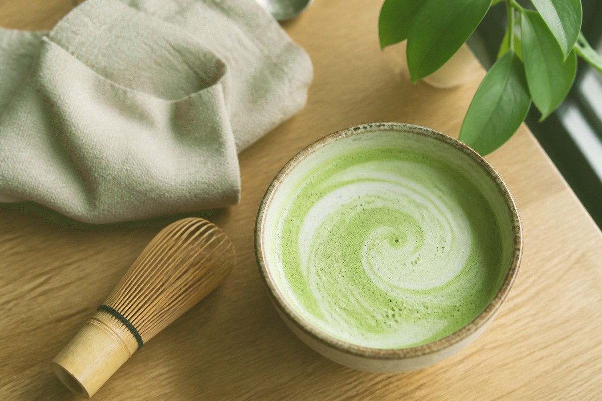 Same photo after Classic Matcha filter with creamy green tones and latte highlights